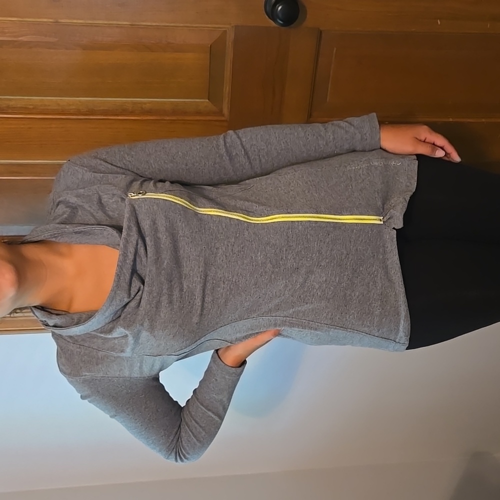 Calvin Klein Performance Top. Grey with  yellow zipper. Size:Small